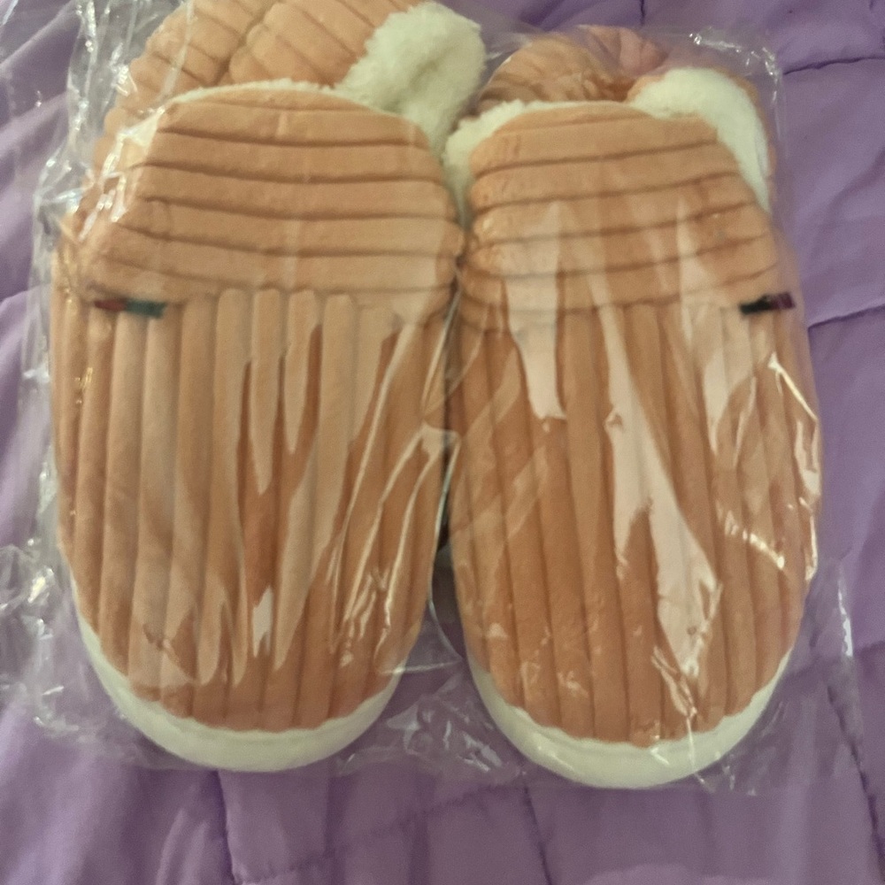 Cozy pink fuzzy oversized slippers